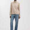 Der Kaschmir-Rollkragenpullover Der Kaschmir-Rollkragenpullover