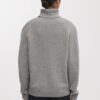 Der Kaschmir-Rollkragenpullover Der Kaschmir-Rollkragenpullover