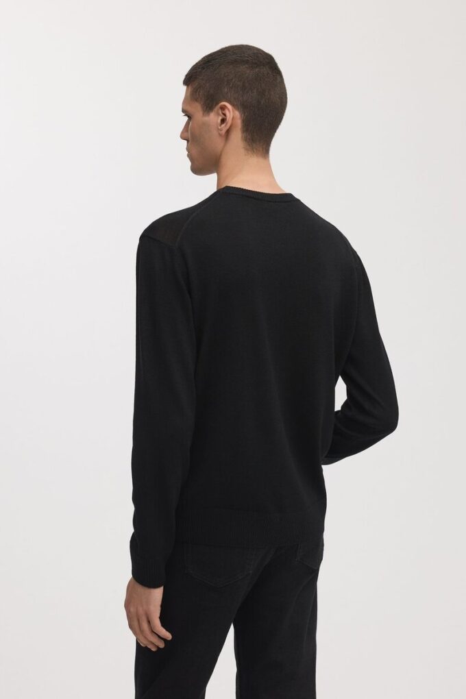 Der Merino-Pullover Der Merino-Pullover