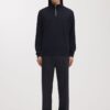 Der Merino-Pullover mit halbem Reißverschluss Der Merino-Pullover mit halbem Reißverschluss
