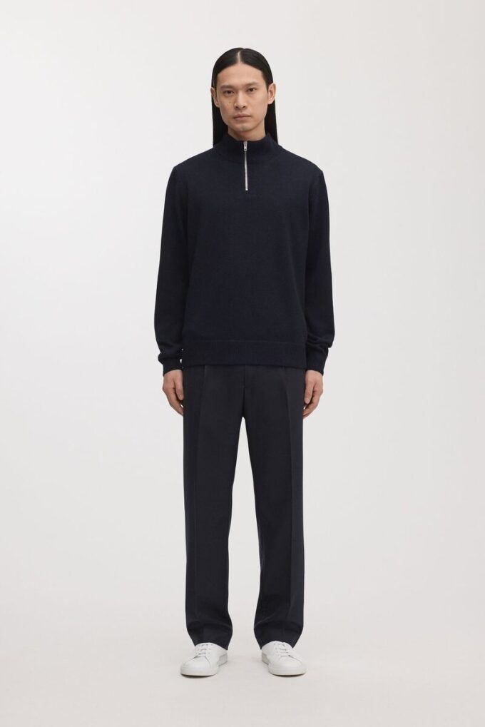 Der Merino-Pullover mit halbem Reißverschluss Der Merino-Pullover mit halbem Reißverschluss