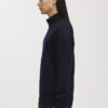 Der Merino-Pullover mit halbem Reißverschluss Der Merino-Pullover mit halbem Reißverschluss