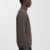 Der Merino-Pullover mit halbem Reißverschluss Der Merino-Pullover mit halbem Reißverschluss