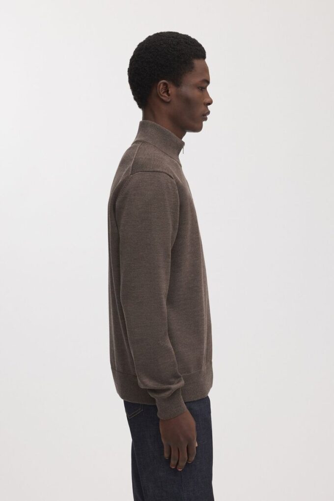 Der Merino-Pullover mit halbem Reißverschluss Der Merino-Pullover mit halbem Reißverschluss