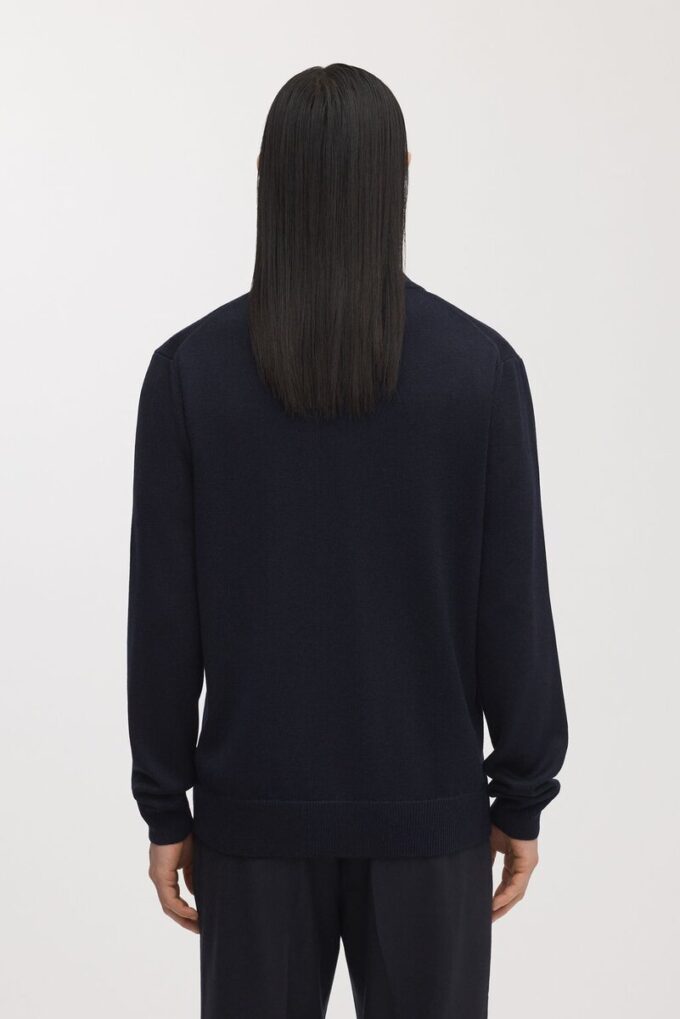 Der Merino-Pullover mit halbem Reißverschluss Der Merino-Pullover mit halbem Reißverschluss