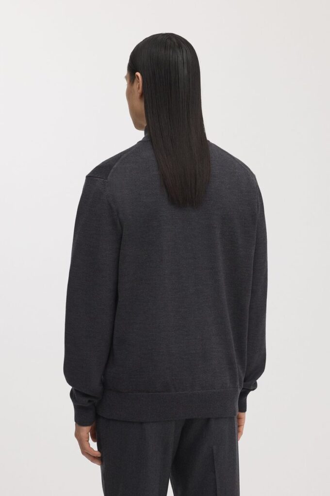 Der Merino-Pullover mit halbem Reißverschluss Der Merino-Pullover mit halbem Reißverschluss