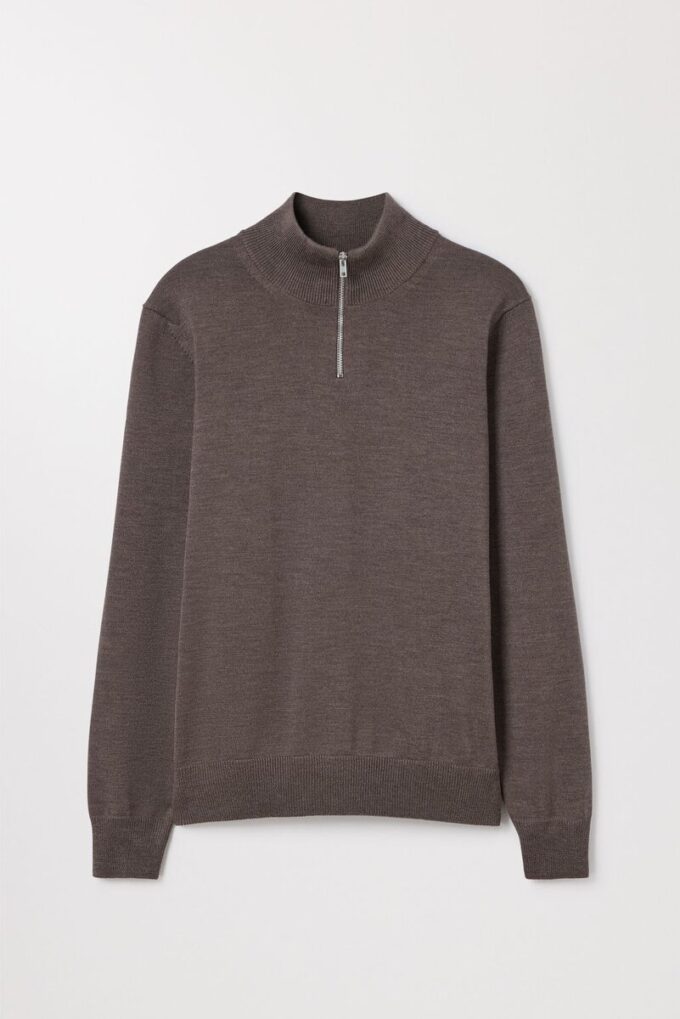 Der Merino-Pullover mit halbem Reißverschluss Der Merino-Pullover mit halbem Reißverschluss
